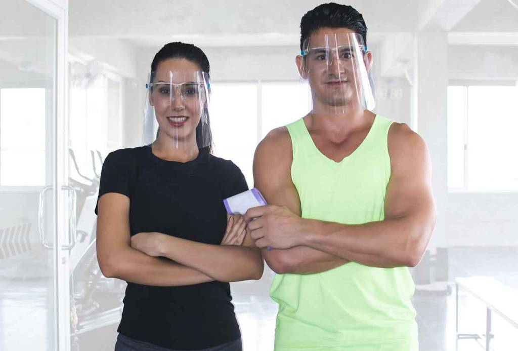 Couple at Gym Wearing Protective Face Shields