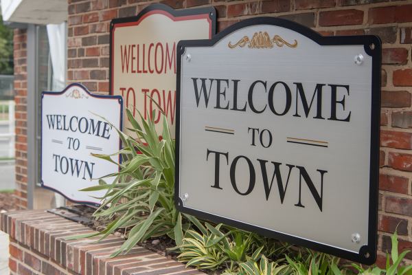 quantity  of commonly shaped custom aluminum signs